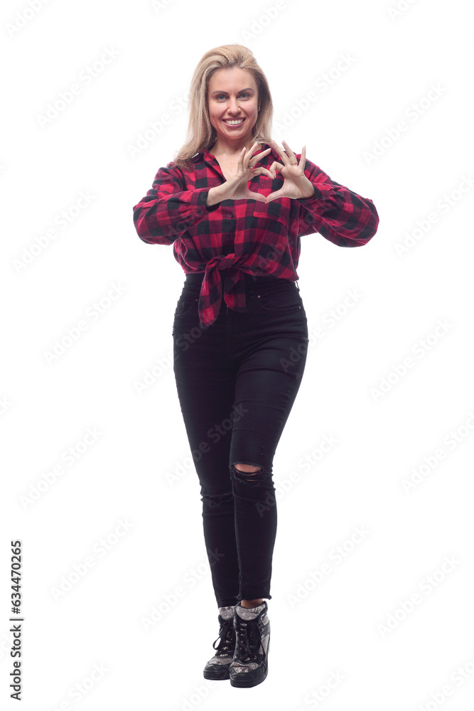 Fototapeta premium casual young woman in a red checked shirt and tight pants.