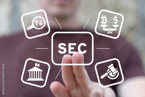 Man using virtual touch screen presses acronym: SEC. Concept of Security Exchange Committee (SEC). SEC exercises control of Exchange Traded Fund (ETF).