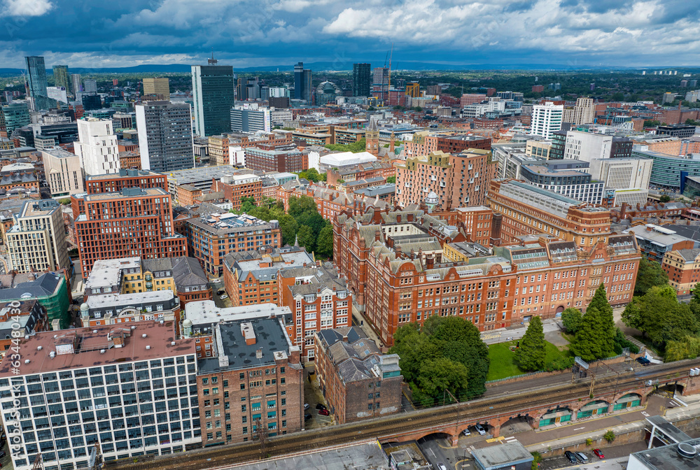 Aerial photo of Manchester downtown showing red brick buildings with distinctive Victorian architecture. Aerial photo of Manchester downtown showing red brick buildings with distinctive Victorian architecture.