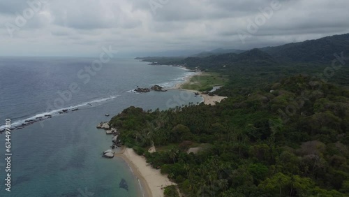 Colombian coastal serenity: aerial drone journey through Tyrona national park drone footage of nature shoreline (ID: 634497810)