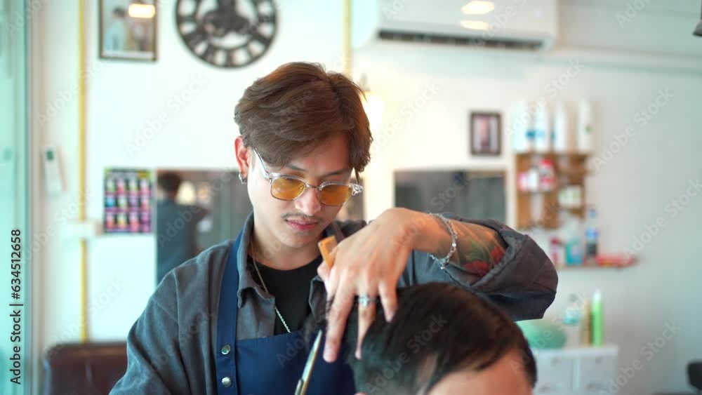 Man have a hair cut at hair design studio. Man have a hair cut at hair design studio.