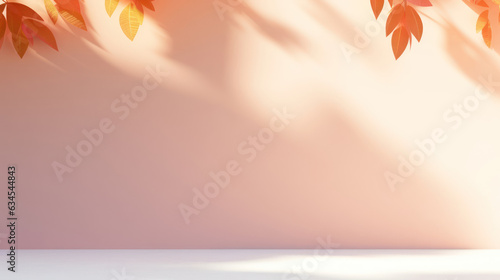 Empty orange light background, wall with soft shadow from leaves