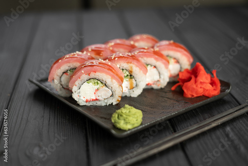 Sushi Roll with tuna, avocado, royal prawn and cream cheese Philadelphia. Sushi menu. Japanese food.