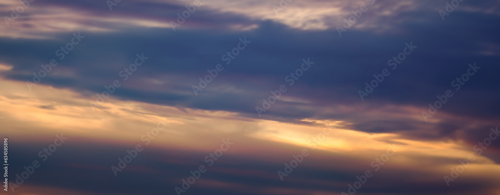 Panoramic photo sunset sky with colorful clouds