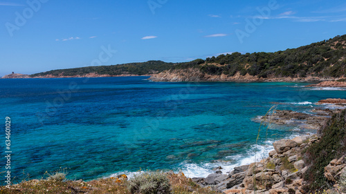 The Corsican coastline with its turquoise sea and blue sky