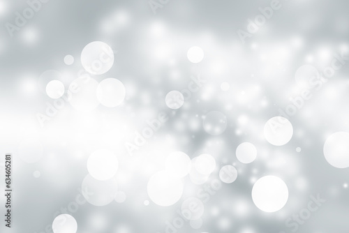 gray and white blur abstract background. bokeh christmas blurred beautiful shiny Christmas lights.