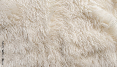 White soft wool texture background, seamless cotton wool, light natural sheep wool, close-up texture of white fluffy fur, wool with beige tone for designer photo