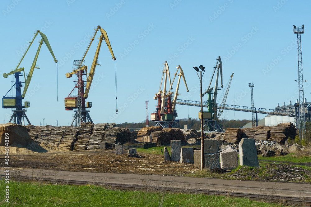 Logs are stacked in the port for loading onto ships.