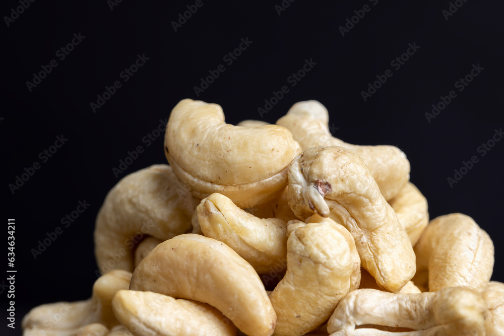 Fresh peeled cashew nuts on the table Fresh peeled cashew nuts on the table