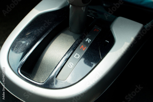 Close up photo of gear shift in a car, after some edits. © Figan