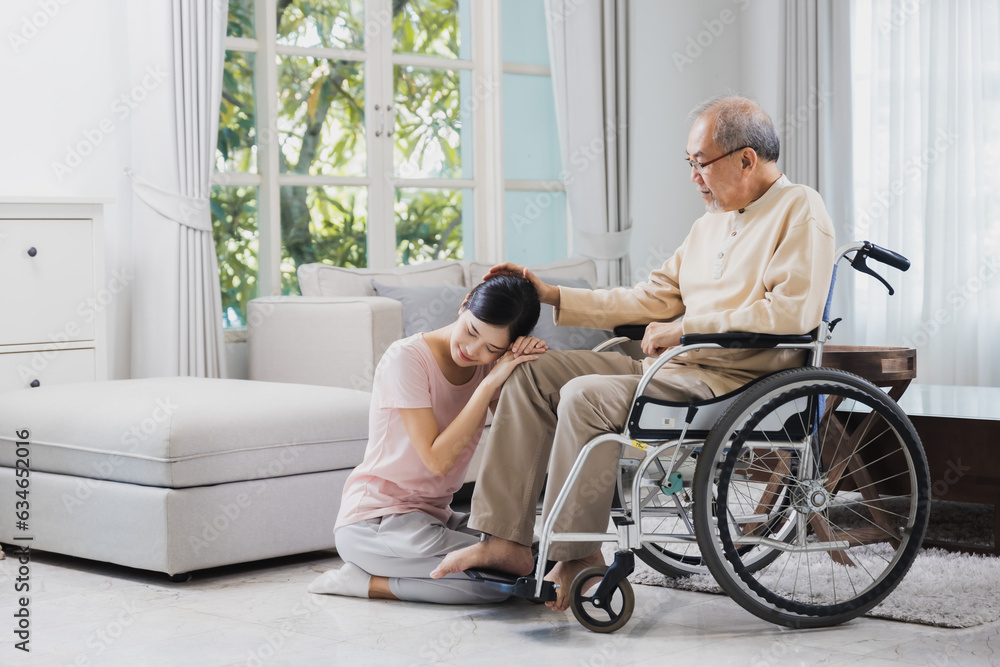 senior with beautiful daughter, old man sitting on wheelchair in house, caressing the head with love and affection senior with beautiful daughter, old man sitting on wheelchair in house, caressing the head with love and affection