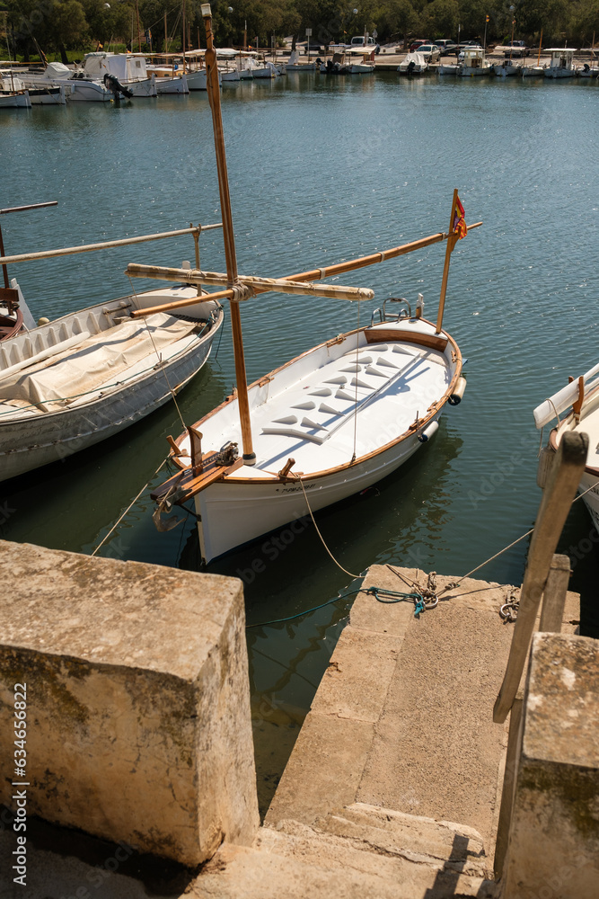 Boats with mast in city port