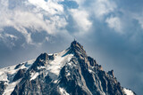The Aiguille du Midi in the Mont Blanc Massif. The summit is 3,842 m high with the cable car, Telepherique de l'Aiguille du Midi stands at 3,777m