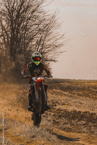 Fototapeta Naklejka Na Ścianę i Meble -  motocross rider on the road