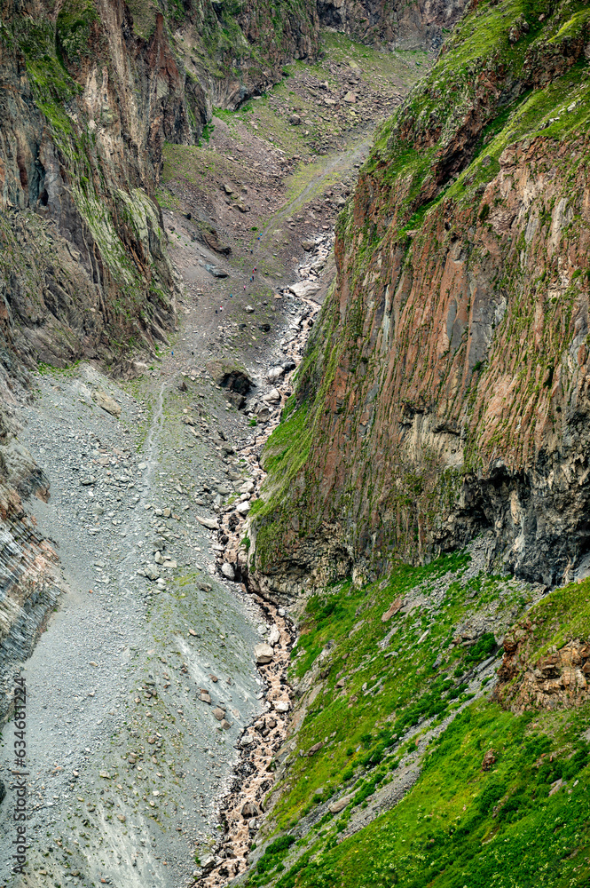 dried up riverbed, mountain stream in gorge. vertical image. beautiful mountain landscape