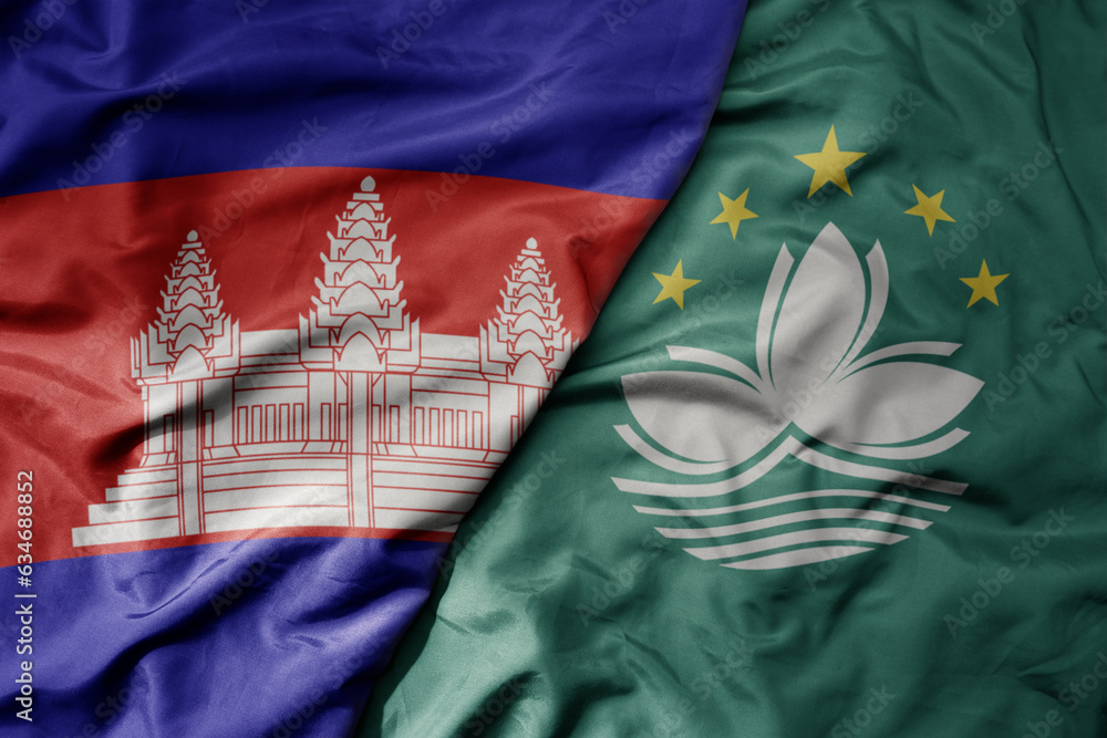 big waving realistic national colorful flag of cambodia and national flag of Macau .