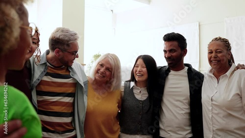 Happy multiethnic people celebrating together - Group of multi-generational friends having fun hugging and supporting each other