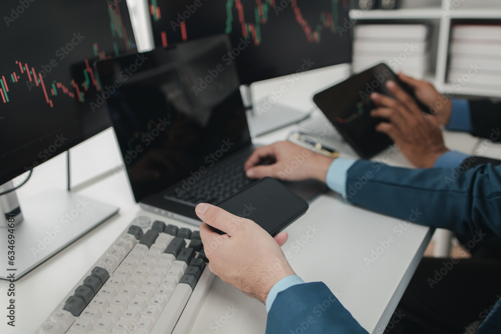 Two stock investors with stock market graph screen, stock fluctuation analysis, business man trading stocks for profit, stock market fluctuation graph screen, profit trading analysis. Two stock investors with stock market graph screen, stock fluctuation analysis, business man trading stocks for profit, stock market fluctuation graph screen, profit trading analysis.
