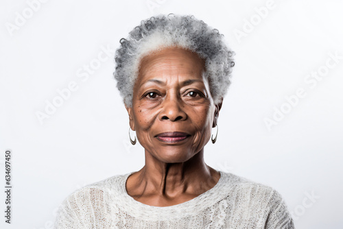 Close-up portrait of an elderly African American woman with gray hair, studio shot, isolated on white background. Generative AI.