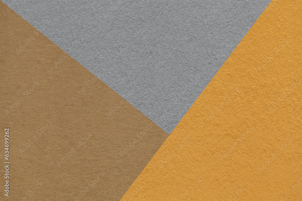 Texture of craft gray, brown and ocher shade color paper background, macro. Structure of vintage abstract cardboard Texture of craft gray, brown and ocher shade color paper background, macro. Structure of vintage abstract cardboard