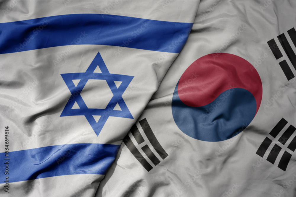Fototapeta premium big waving realistic national colorful flag of israel and national flag of south korea .