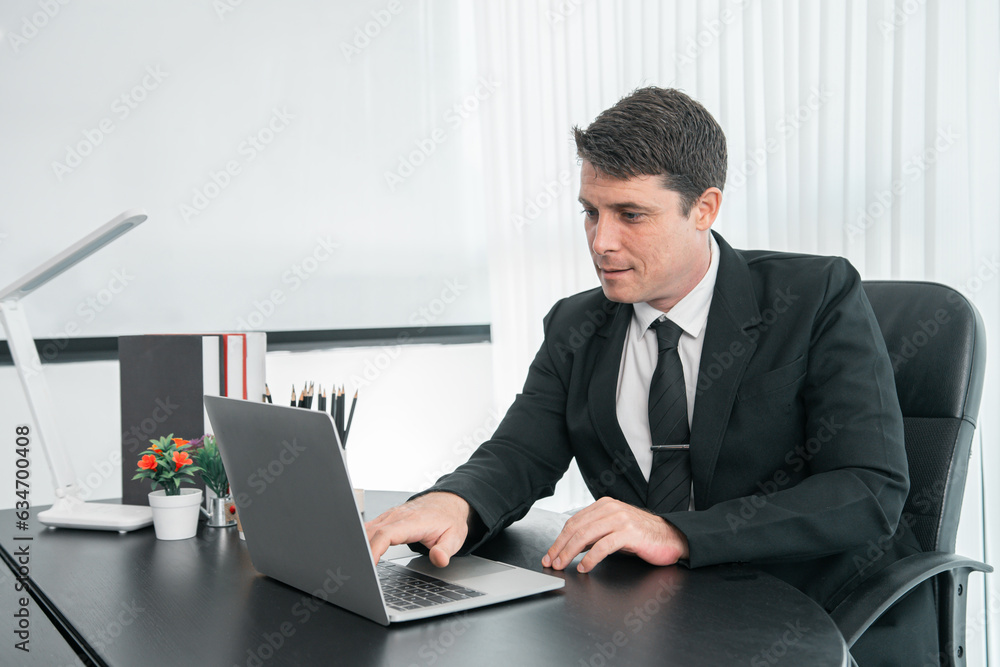 businessman sitting at worktable at modern office analyzing company performance, finance and investment businessman sitting at worktable at modern office analyzing company performance, finance and investment