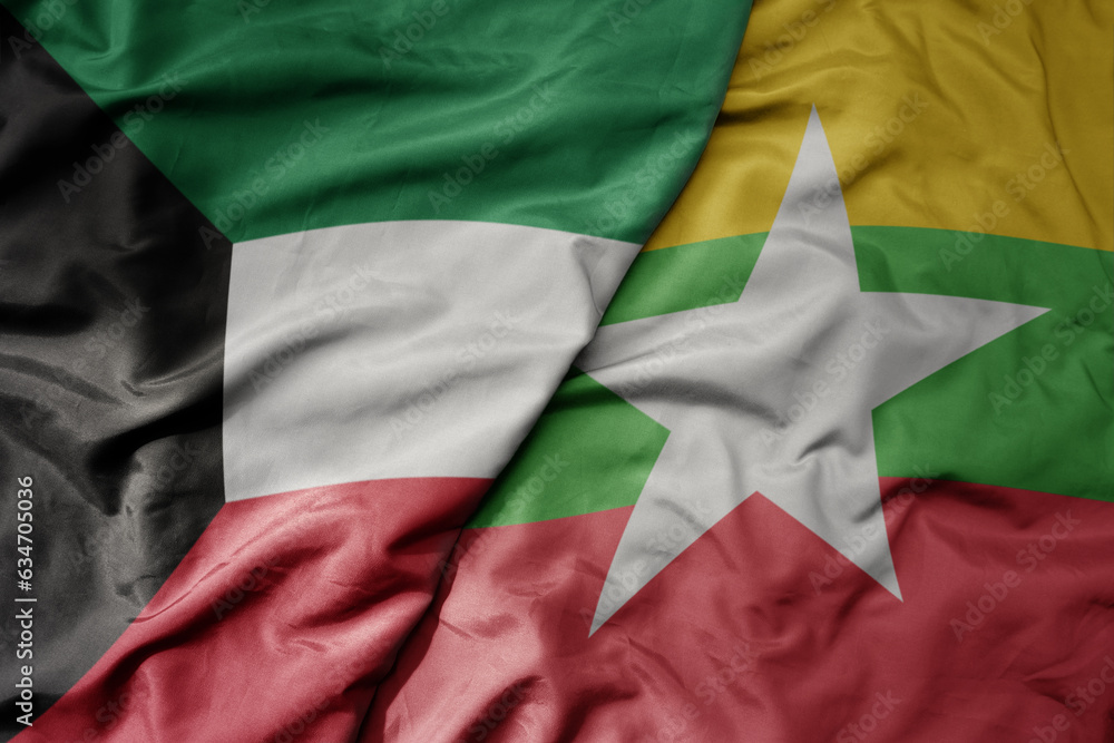 big waving realistic national colorful flag of kuwait and national flag of myanmar .