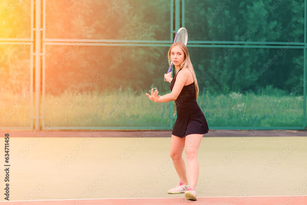 Tennis tournament. Female player at the clay tennis court
