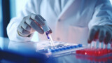 Close-up of a doctor carefully handling a blood test tube in a clinical setting