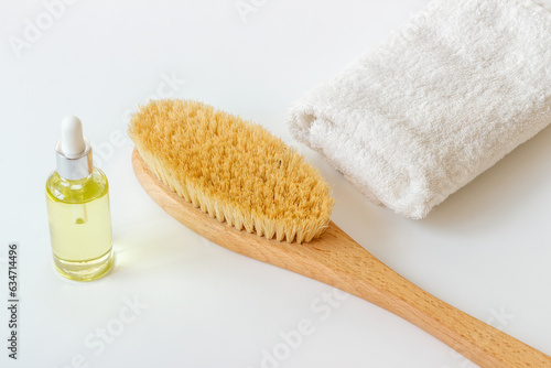 Massage and bath brush with towel. Spa set concept