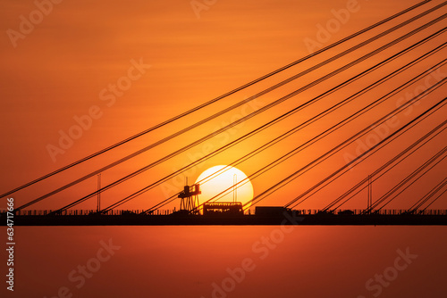 Photography Traffic on suspension bridge in Hong Kong under sunset