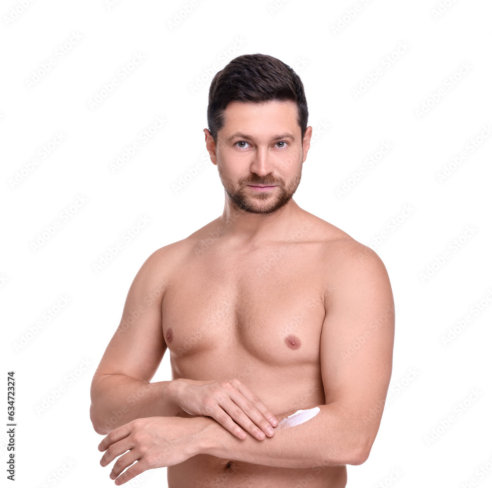 Handsome man applying sun protection cream onto arm against white background Handsome man applying sun protection cream onto arm against white background