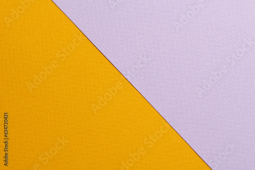 Rough kraft paper background, paper texture lilac yellow colors. Mockup with copy space for text.