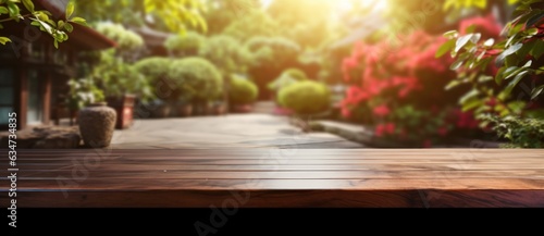 Empty wooden table on natural background