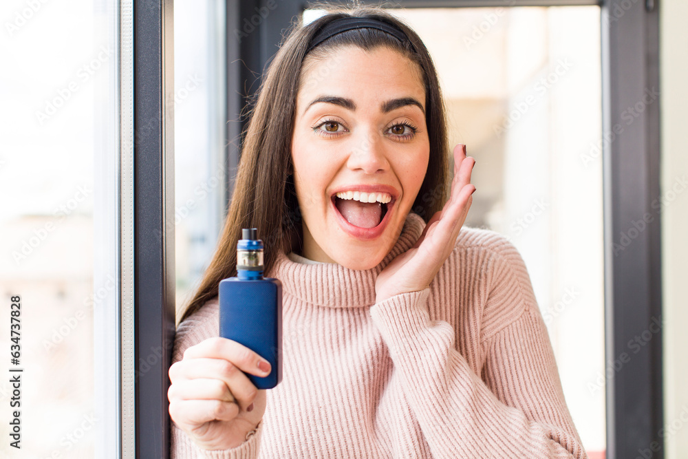 pretty young woman with a vaper. house interior design pretty young woman with a vaper. house interior design