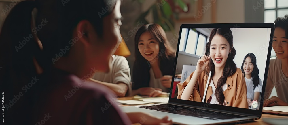 Asian female teacher and diverse students video calling on laptop for distant learning - obrazy, fototapety, plakaty 