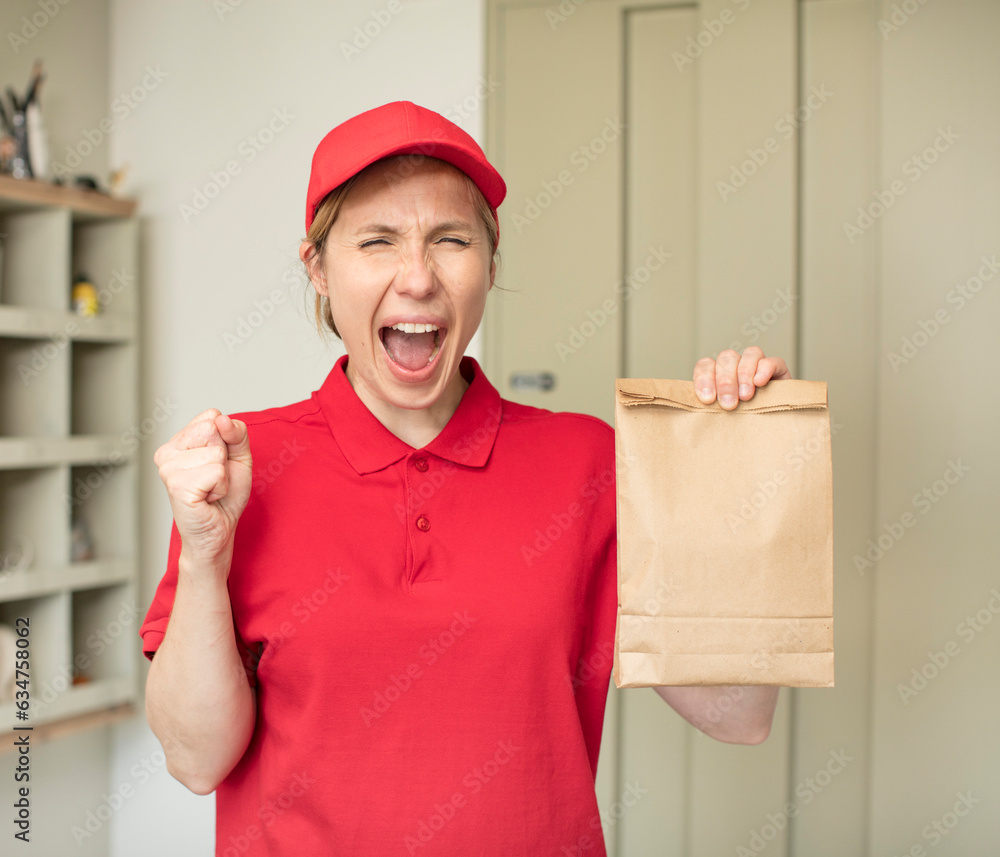 looking angry, annoyed and frustrated. delivery and take away concept looking angry, annoyed and frustrated. delivery and take away concept