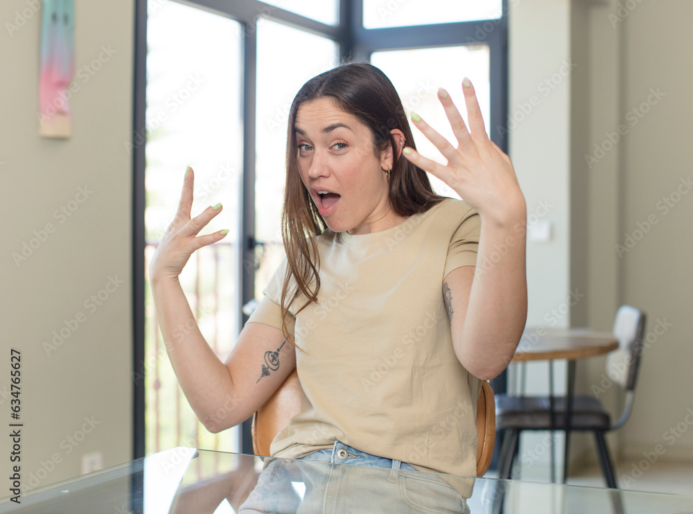 young pretty woman looking proud, arrogant, happy, surprised and satisfied, pointing to self, feeling like a winner young pretty woman looking proud, arrogant, happy, surprised and satisfied, pointing to self, feeling like a winner