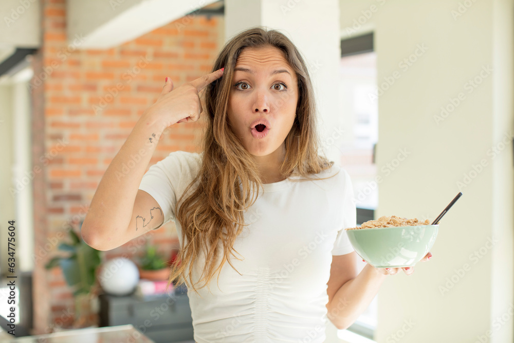 pretty woman looking happy, astonished and surprised. breakfast bowl concept pretty woman looking happy, astonished and surprised. breakfast bowl concept