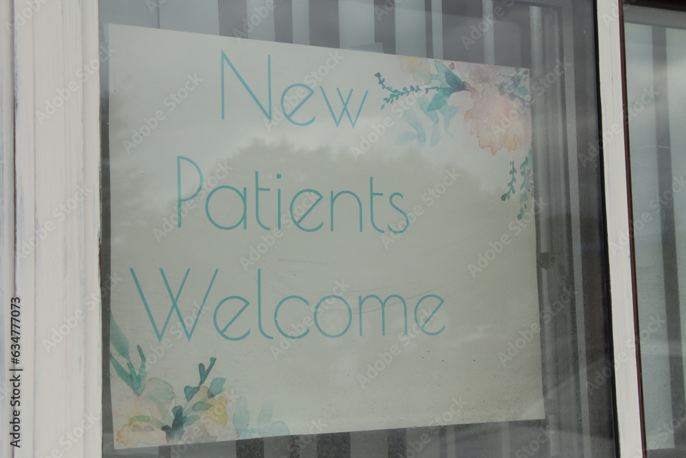 new patients welcome writing caption text sign inside window , green ...