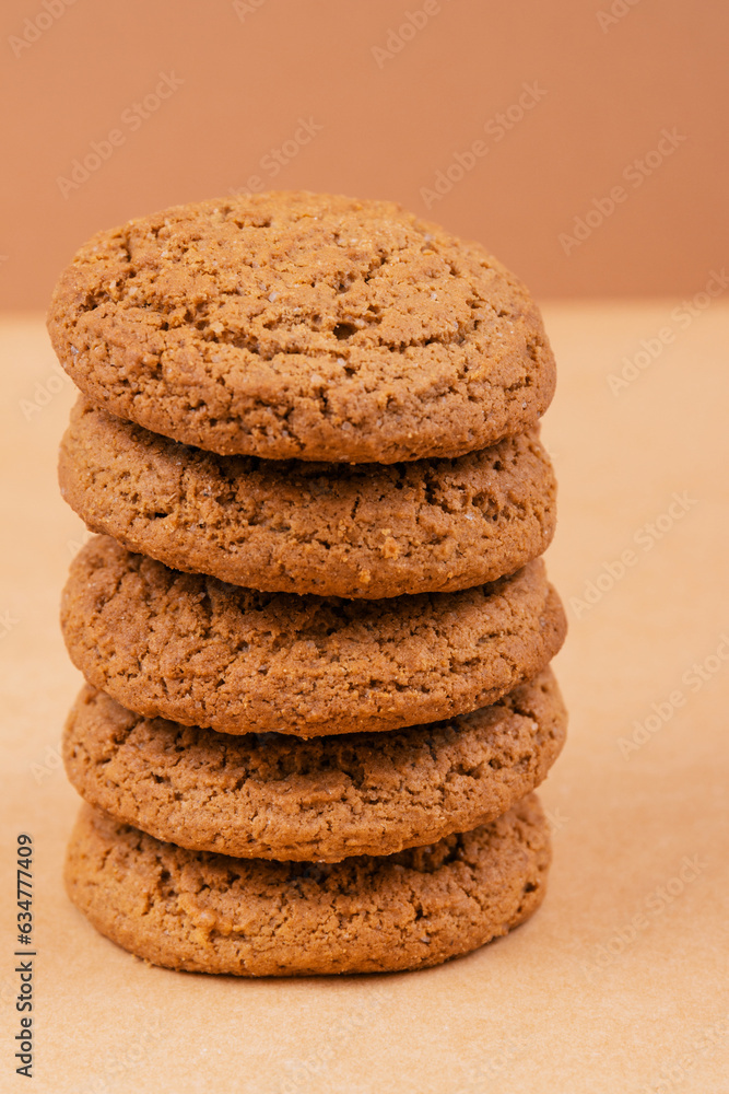 Stack of cookies. Oatmeal cookies on beige background. Stack of cookies. Oatmeal cookies on beige background.