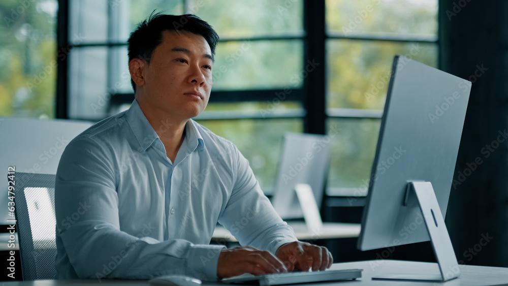 Thoughtful asian korean chinese ceo businessman dreamer smart japanese man guy sit at office desk planning business plan think idea in mind create strategy startup project use computer online work Thoughtful asian korean chinese ceo businessman dreamer smart japanese man guy sit at office desk planning business plan think idea in mind create strategy startup project use computer online work