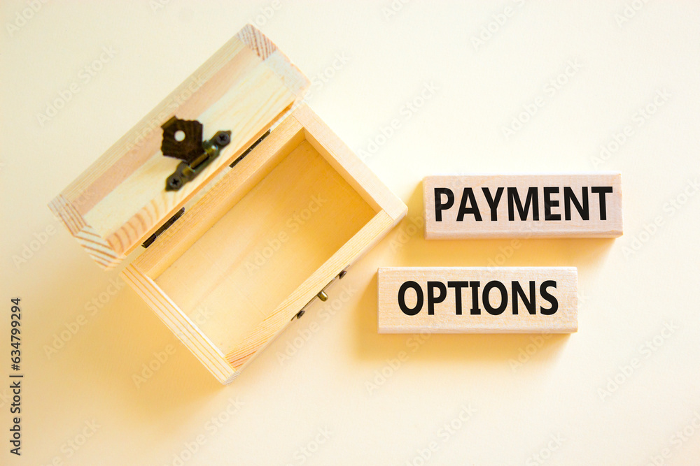 Payment options symbol. Concept words Payment options on beautiful wooden block. Beautiful white table white background. Wooden empty chest. Business payment options concept. Copy space. Payment options symbol. Concept words Payment options on beautiful wooden block. Beautiful white table white background. Wooden empty chest. Business payment options concept. Copy space.