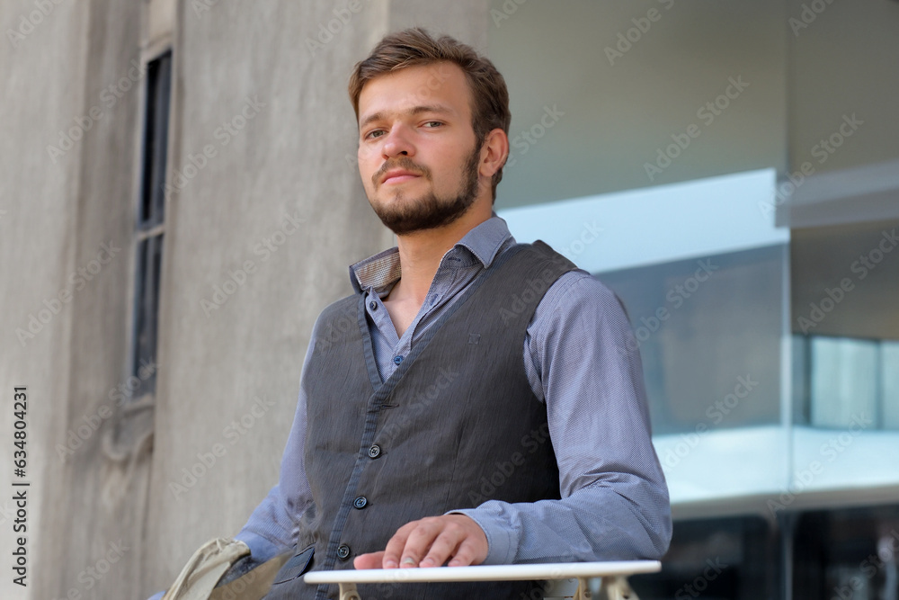 Street portrait of a young handsome man