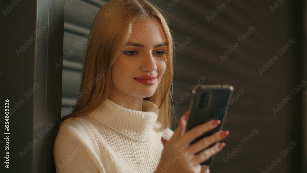 Caucasian girl woman use phone indoors typing on smartphone touchscreen send message female businesswoman lady student happy client smiling shopping online e-commerce mobile app browsing social media Caucasian girl woman use phone indoors typing on smartphone touchscreen send message female businesswoman lady student happy client smiling shopping online e-commerce mobile app browsing social media
