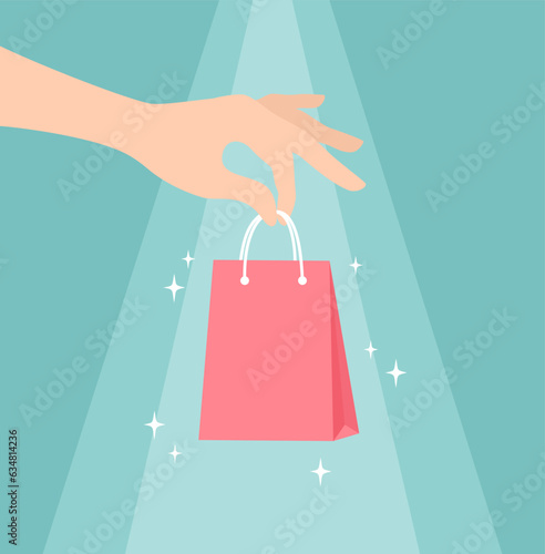 A hand holding a red sparkling package in its fingers. Vector illustration in flat style