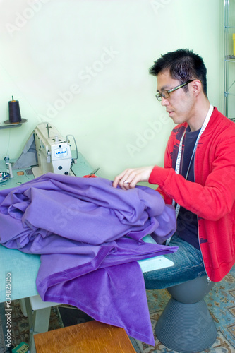 Asian Man Sewing Clothes at Home, (PS-43461)