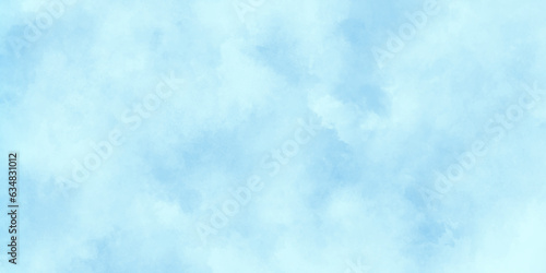 Natural and cloudy fresh blue sky background, shiny and soft sky blue watercolor texture, blurred and grainy Blue powder explosion on white background, Classic hand painted Blue watercolor background.