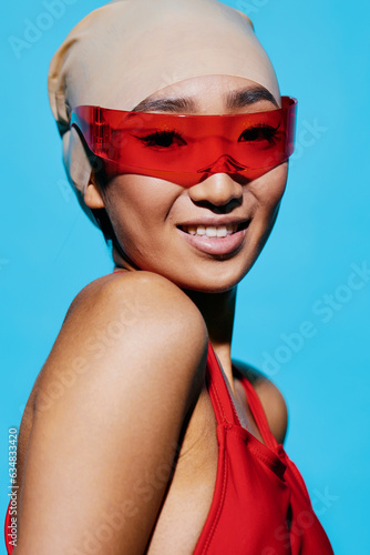Fashion woman emotion white sunglasses cute portrait blue beauty smiling beach asian red fashionable