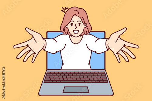 Cheerful woman looks out of laptop with VR effect of virtual reality and spreads arms to sides, wanting to hug you. Laptop with positive girl from internet advertising on website or in software
